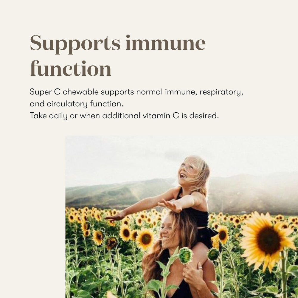 Young Living Super C chewables in travel-friendly bottle on desk