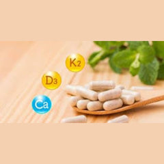 Young Living Super Cal Plus ingredients close-up: calcium, magnesium, vitamins D and K