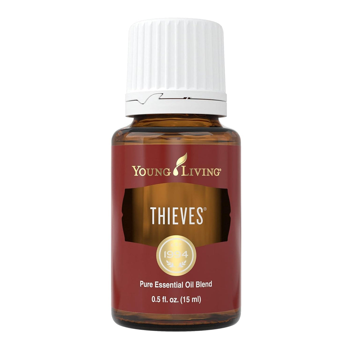 Young Living Thieves bottle pour for daily refreshing aroma and mood support.