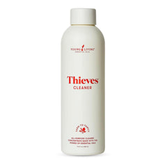 Young Living Thieves cleaner bottle label highlights plant-based ingredients for safe cleaning.