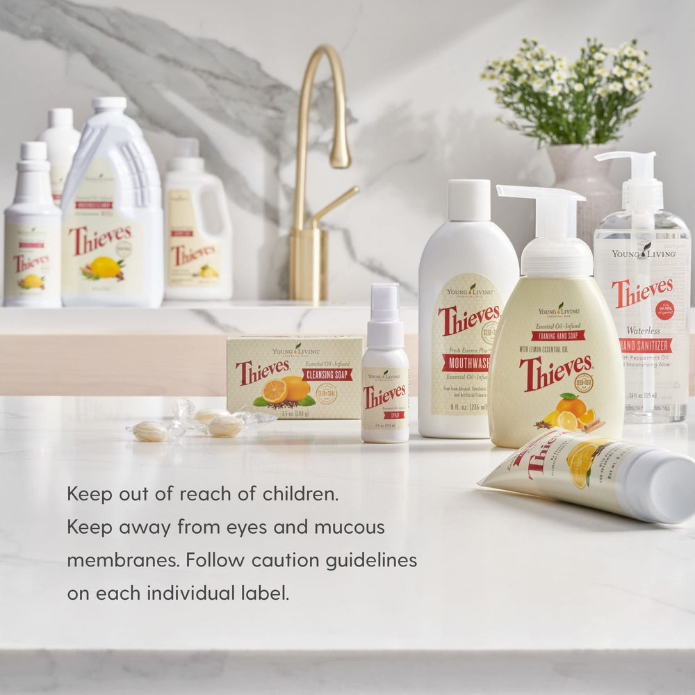 Young Living Thieves hard lozenges on a desk during a meeting for dry-mouth relief