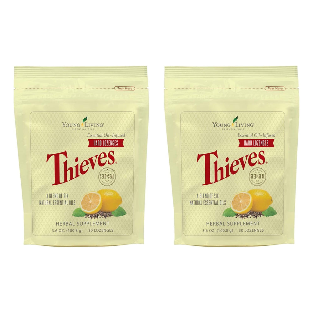 Young Living Thieves Hard Lozenges packaging on a desk for on-the-go use