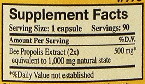 Close-up of YS Eco Bee Farms Propolis Raw 1000mg capsules highlighting bioflavonoids