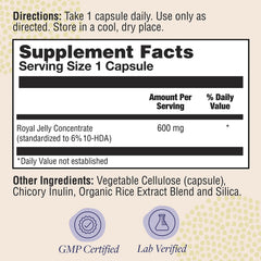 ZAND Bee Therapy capsules close-up shows vegan, convenient daily supplement.