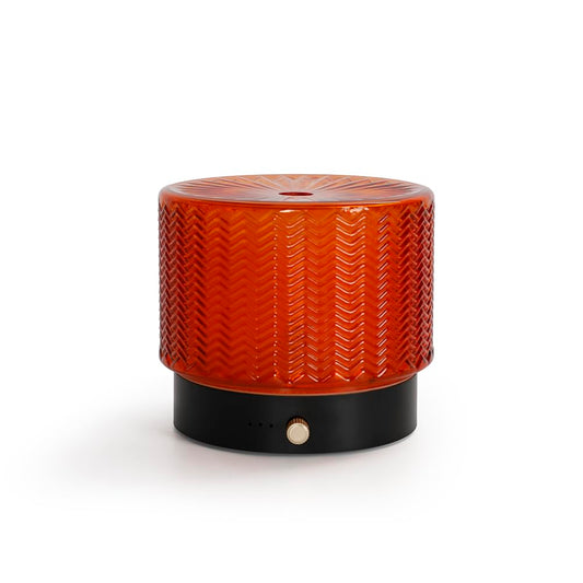 ZEIGGA LAB glass diffuser body releasing a calming aroma through soft mist.