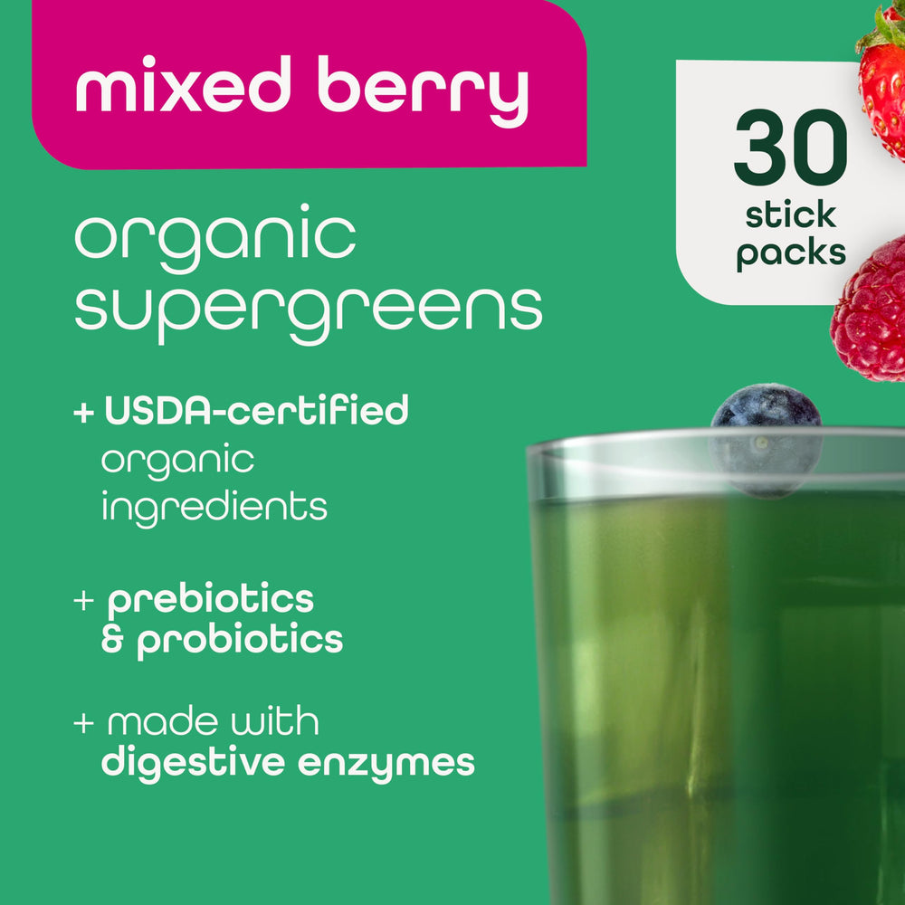 Zena Nutrition Organic Super Greens mixed berry flavor in glass of water