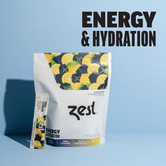 ZEST energy and focus packets being poured into water for quick hydration and alertness.