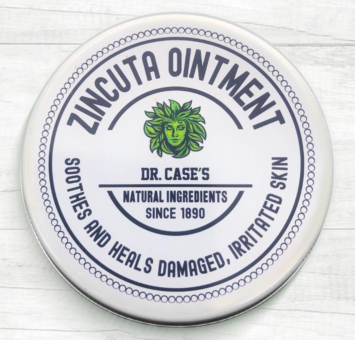 Zincuta Healing Ointment tin front for all-natural skin relief and hydration.