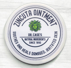Zincuta Healing Ointment tin front for all-natural skin relief and hydration.
