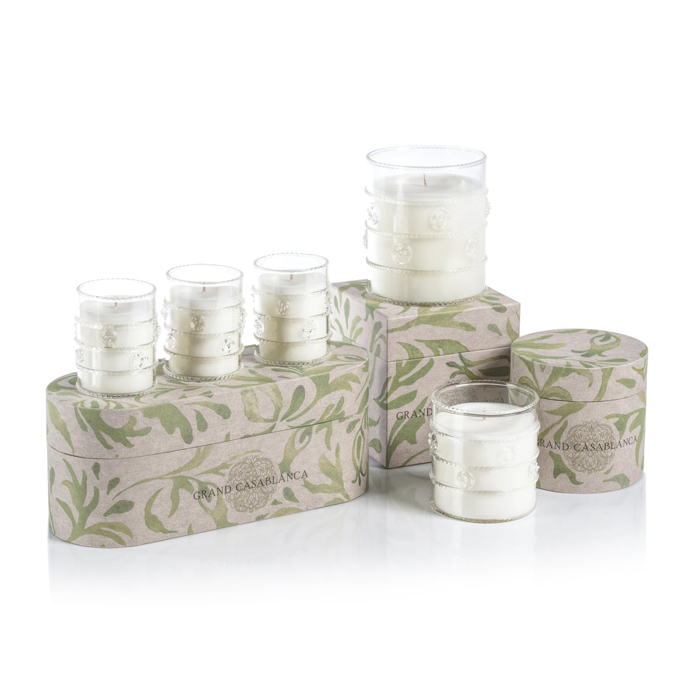 Close-up of Neroli Absolute fragrance in a stylish glass jar