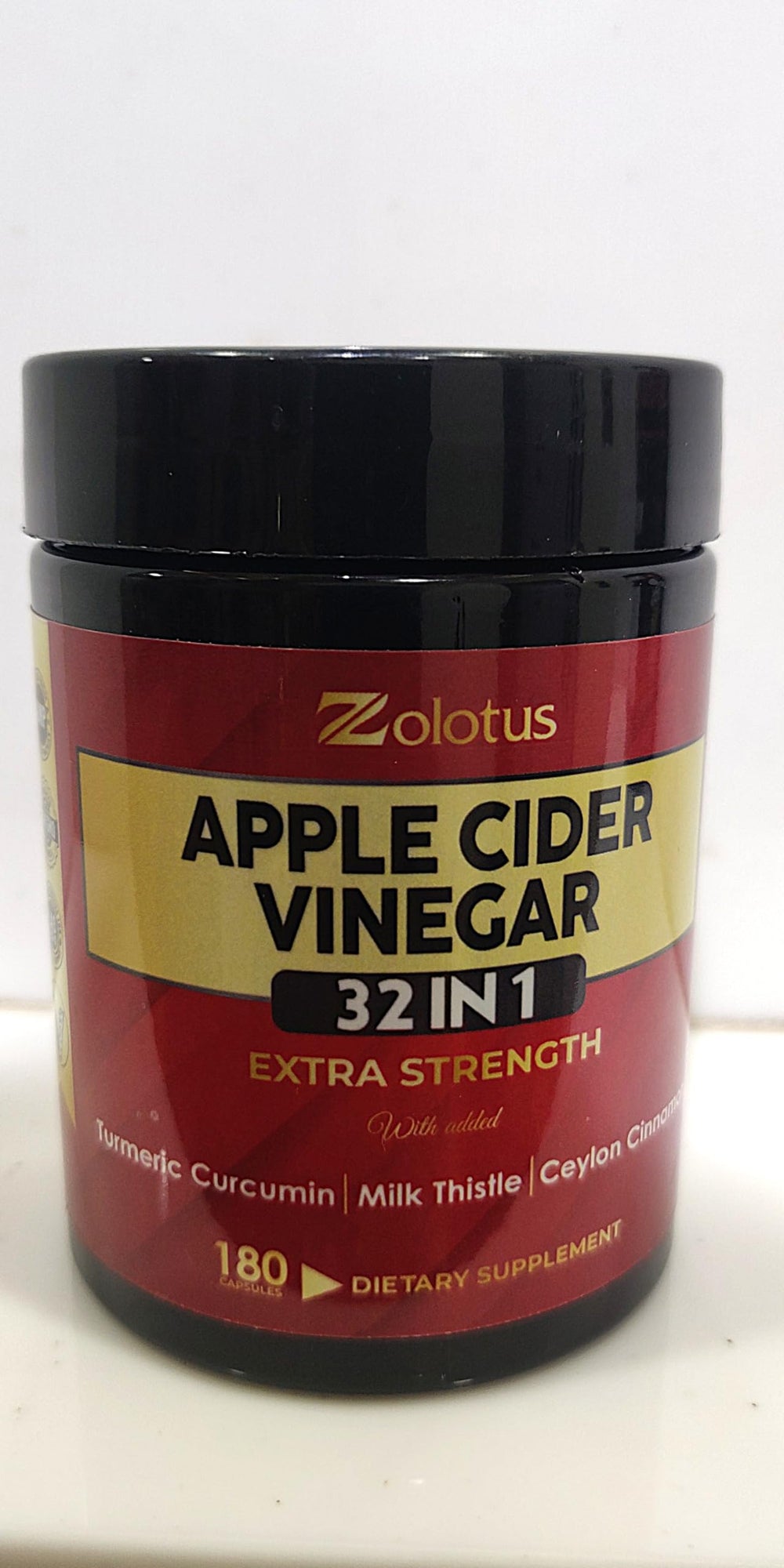 Zolotus 32in1 ACV capsules being poured for convenient daily use