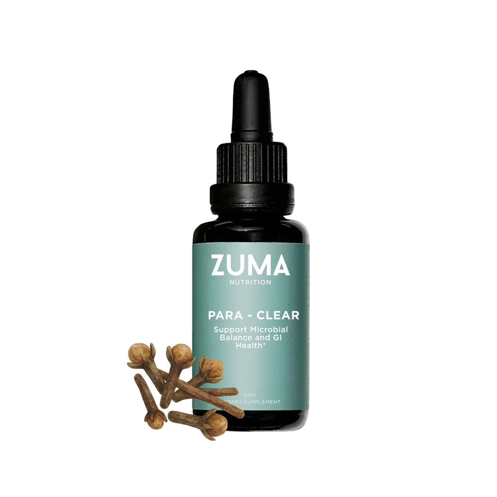 Zuma Nutrition Para-Clear bottle closeup showing liquid texture for daily plant-based wellness.