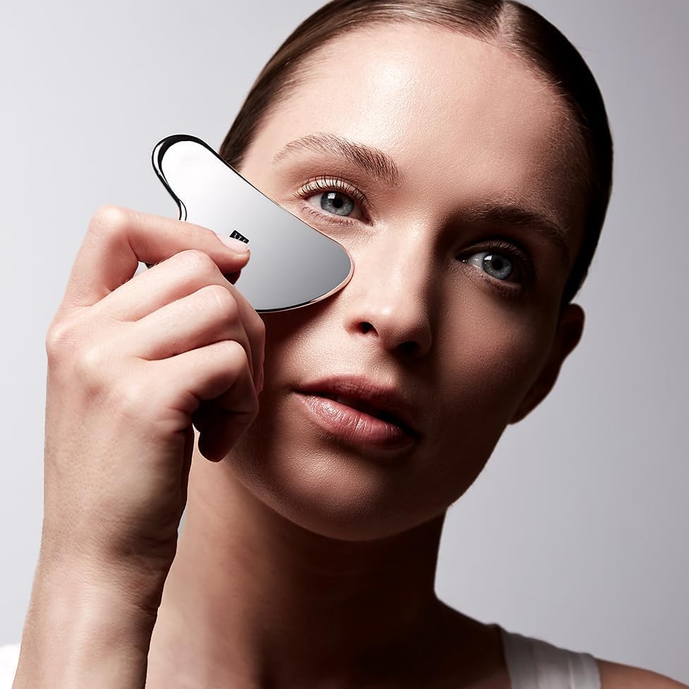 ZWILLING facial massager in hand highlights ergonomic grip for targeted massage