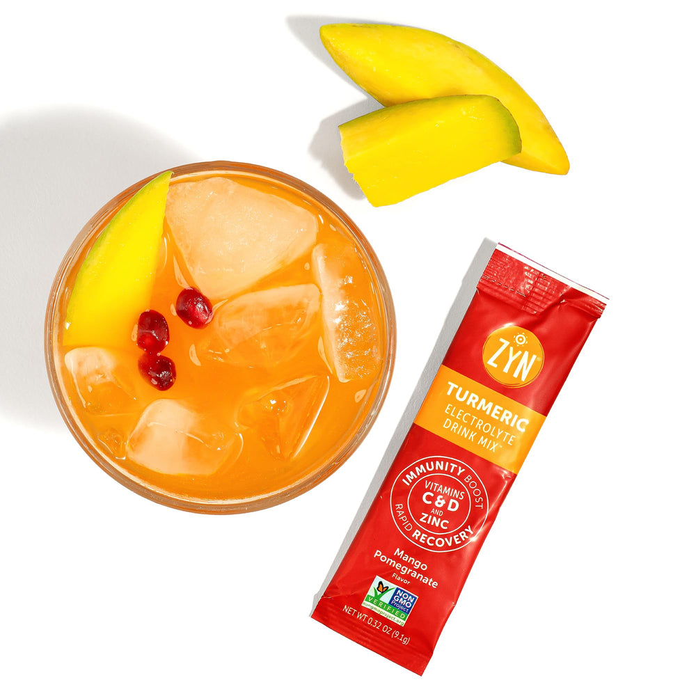 Family picnic scene with ZYN mango-pomegranate hydration for everyone